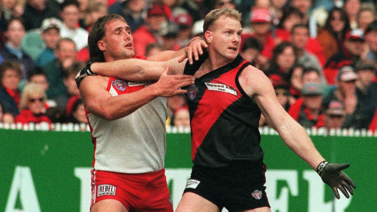 Former Essendon star Dean Wallis recovering from lifesaving surgery after heart attack