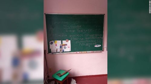 This message found on a blackboard in a school in Zdvyzhivka says "Putin is your president. Children, study diligently, Russia needs educated citizens!"