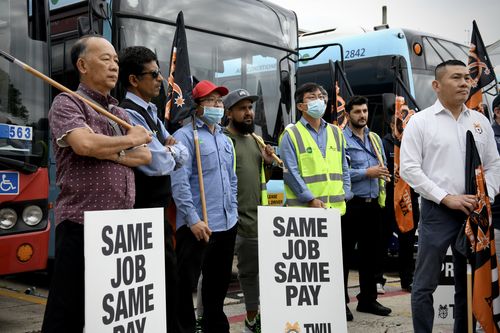 Photographs show scenes from Burwood Bus Depot this morning where unions and their who represent bus drivers staged a picket line in a two day planned action against the disparity in pay and conditions between private and public sector drivers. Representing the Transport Workers Union was state secretary Richard Olsen ( white hair, suit jacket and light blue collar shirt) Mark Morey, head of Unions NSW ( suit jacket, balding and sky blue collared shirt and David Babinau, NSW Railway, Tram and Bu