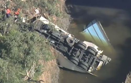 The driver was trapped for some time before being rescued by authorities. Picture: 9NEWS
