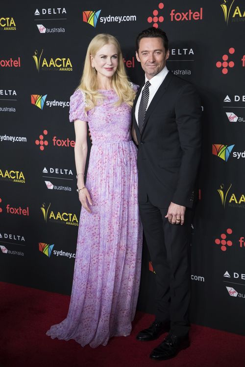 Nicole Kidman, left, and Hugh Jackman pose for photographers upon arrival at the AACTA International Awards. (AAP)