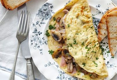 Fluffy cheese and mushroom omelette