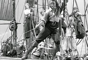 When did Errol Flynn's Captain Blood first appear in theatres?