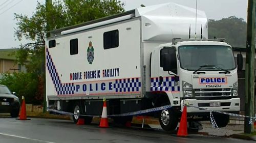 Forensic officers are expected to be at the crime scene for some time. (Image: 9NEWS)