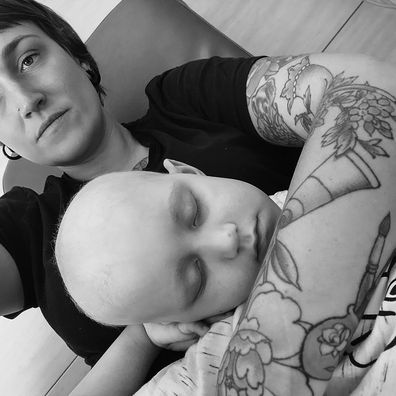 Ollie Jepson in mum Naomi's arms during cancer treatment.