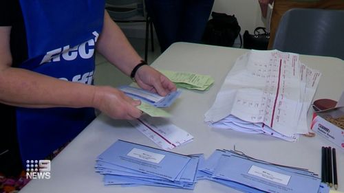 Voters in isolation can register online to pick up a voting pack from one of the 22 PCR testing sites or RAT collection points. 