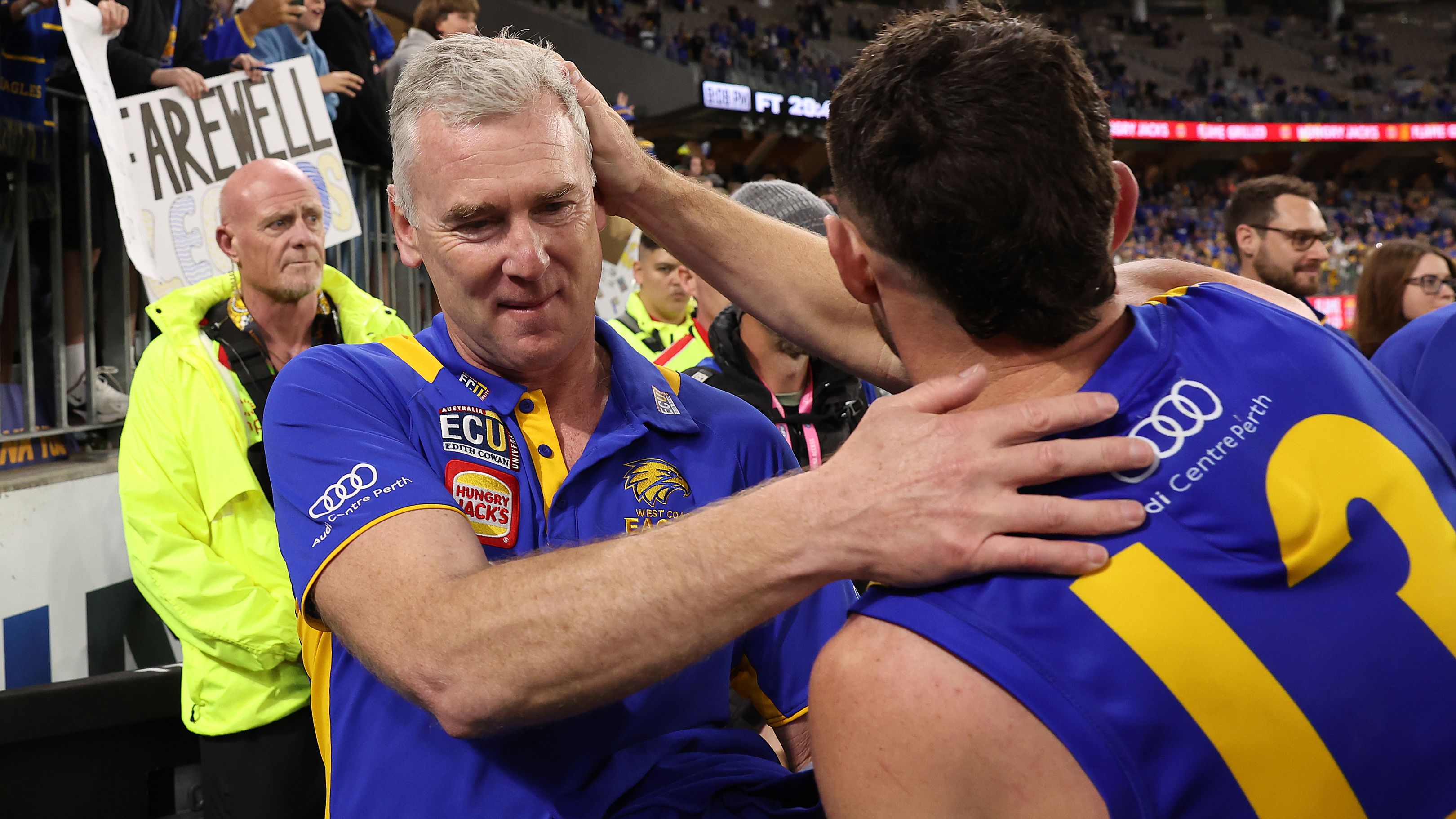 PERTH, AUSTRALIA - AUGUST 26: Adam Simpson, head coach of the Eagles shares a moment with Luke Shuey following the round 24 AFL match between the West Coast Eagles and Adelaide Crows at Optus Stadium, on August 26, 2023, in Perth, Australia. (Photo by Paul Kane/Getty Images)