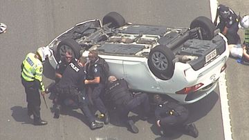 Police were quick to pounce making an arrest moments after the car flipped.
