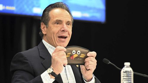 New York Governor Andrew Cuomo touts a Thanksgiving-themed mask.