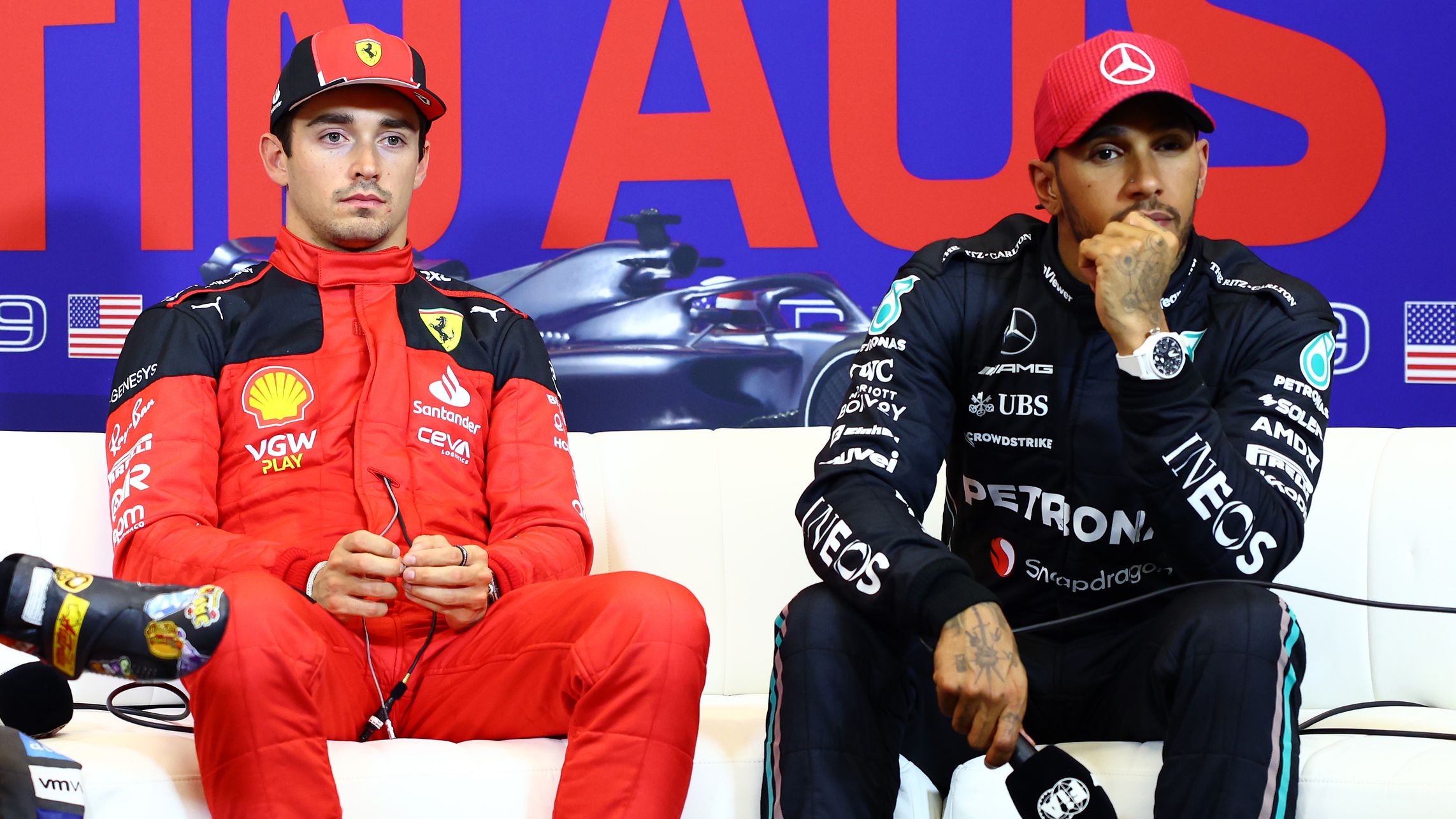 Pole position qualifier Charles Leclerc of Monaco and Ferrari, Second placed qualifier Lando Norris of Great Britain and McLaren and third placed qualifier Lewis Hamilton of Great Britain and Mercedes talk in a press conference after qualifying ahead of the F1 Grand Prix of United States.