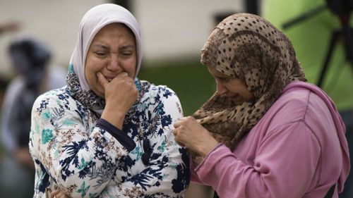 Members of the local Muslim community joined together to denounce terrorism and show their grief in Ripoll, north of Barcelona on Saturday. (AAP)