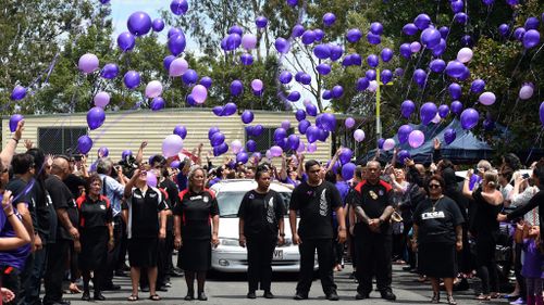 Hundreds of purple balloons were released into the air in a nod to Tiahleigh's favourite colour. (AAP)