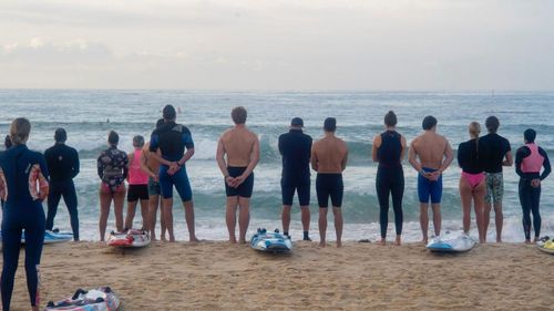 Members of the Bondi Surf Club board section held a minute's silence for Louise Santos.