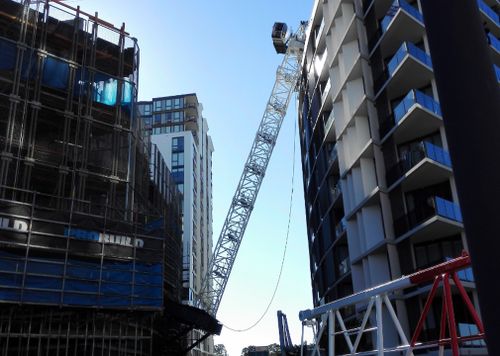 Locals have launched a compensation claim against the crane's operator Probuild. (9NEWS)