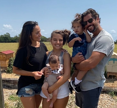 Wood with wife Snezana, stepdaughter Eve who is holding daughter Charlie, and Willow.