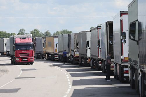 Trucks stands at the post-customs international checkpoint Chernyshevskoye at the Russian-Lithuanian border in Kaliningrad region, Russia, Wednesday, June 22, 2022.  