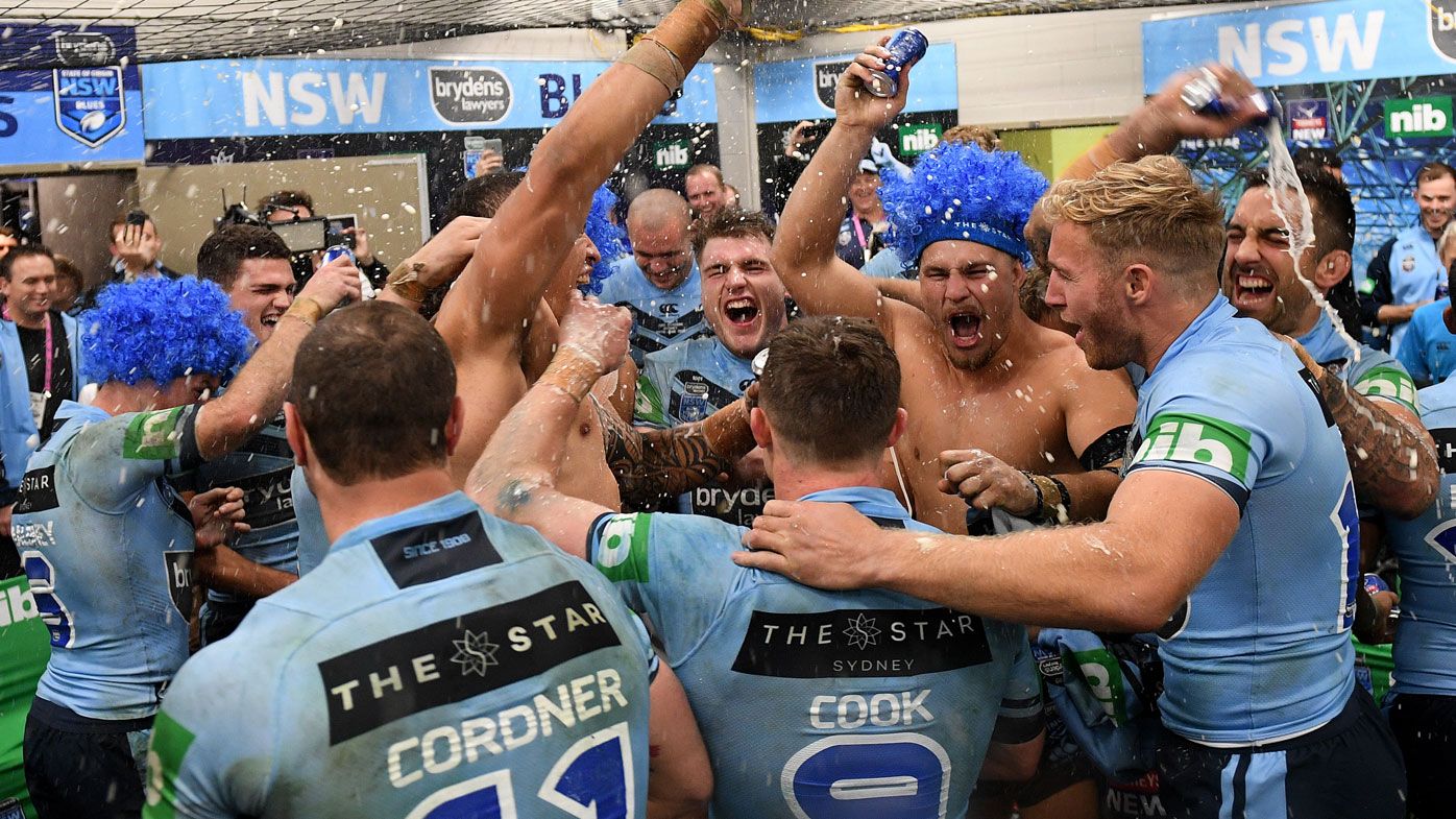 The NSW Blues celebrate Origin victory.