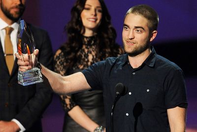 Robert Pattinson accepted the award on behalf of the cast. They beat <i>Moneyball</i>, <i>The Help</i>, <i>Limitless</i> and <i>The Adjustment Bureau</i>.<br/><br/><b><a target="_blank" href="http://celebrities.ninemsn.com.au/blog.aspx?blogentryid=969643&showcomments=true">Click to vote: R-Pattz's new hair - love it or hate it?</a></b>
