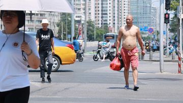 China is taking a tougher stand on male shirtlessness.