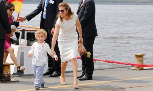 Sophie Gregoire-Trudeau, wife of Canada's Prime Minister Justin Trudeau, and their son Hadrien leave a ship after a boat tour of the spouses program on the first day of the G20 summit in Hamburg. (AAP)