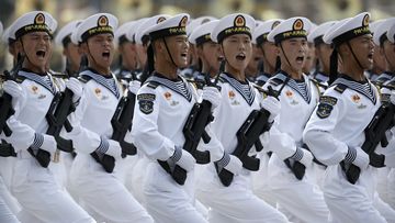 FILE - Soldiers from China&#x27;s People&#x27;s Liberation Army (PLA) Navy march in formation during a parade to commemorate the 70th anniversary of the founding of Communist China in Beijing, Oct. 1, 2019. With Russias military failings in Ukraine mounting, no country is paying closer attention than China to how a smaller, outgunned force has badly bloodied what was thought to be one of the worlds strongest armies. (AP Photo/Mark Schiefelbein, File)