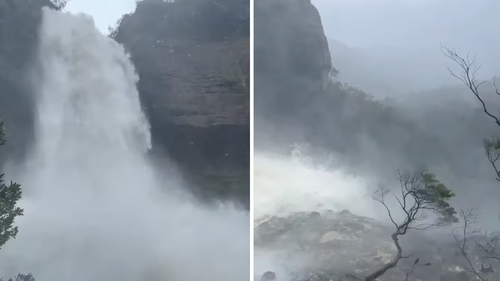 The raging water was filmed bounding down multiple cliffs.