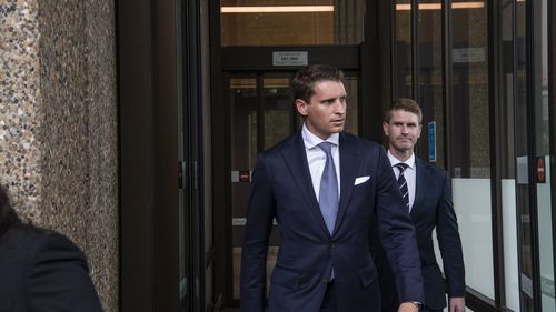 Andrew Hastie leaving Federal Court. 