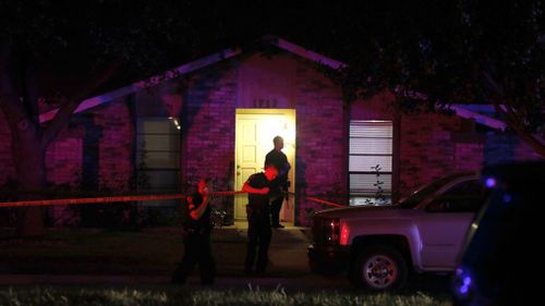 Police officers at the scene of the Plano shooting. (AAP)