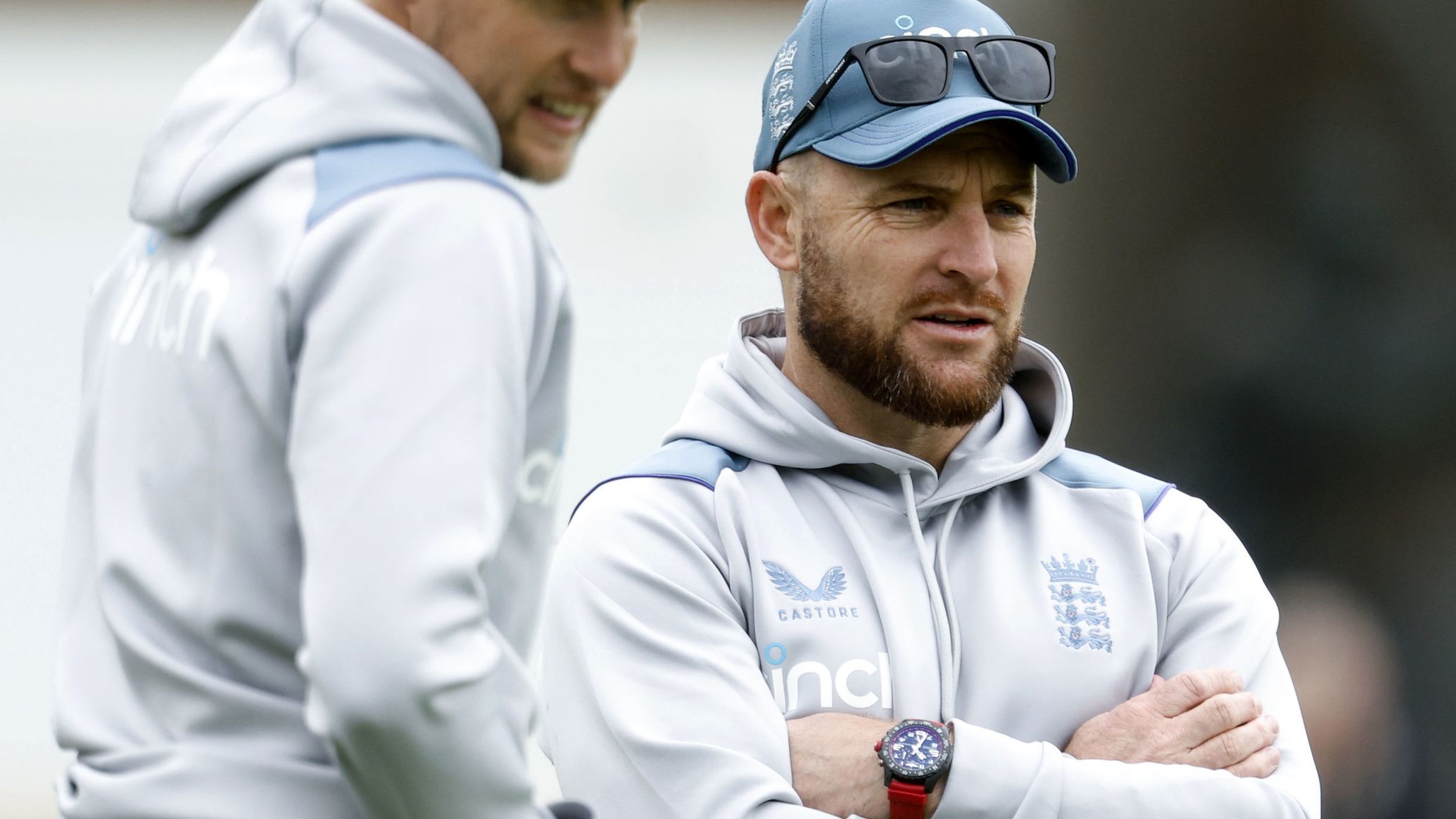New England men&#x27;s test coach Brendon McCullum, right, stands with former captain Joe Root at a nets session at Lord&#x27;s Cricket Ground.