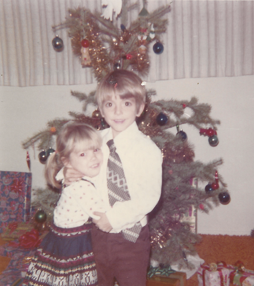 Carine and Chris McCandless share a Christmas hug. The pair were close in age with a three-year gap between them.