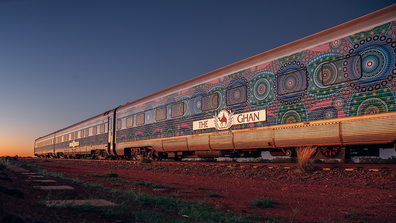 The Ghan artwork at sunset