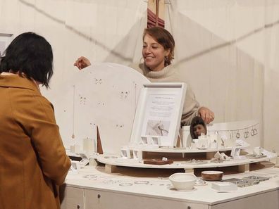 Argent Silversmith founder Elizabeth Herman selling jewellery at a market.