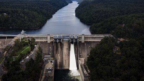 Warragamba Dam spills on 06 January, 2020. Photo: Brook Mitchell