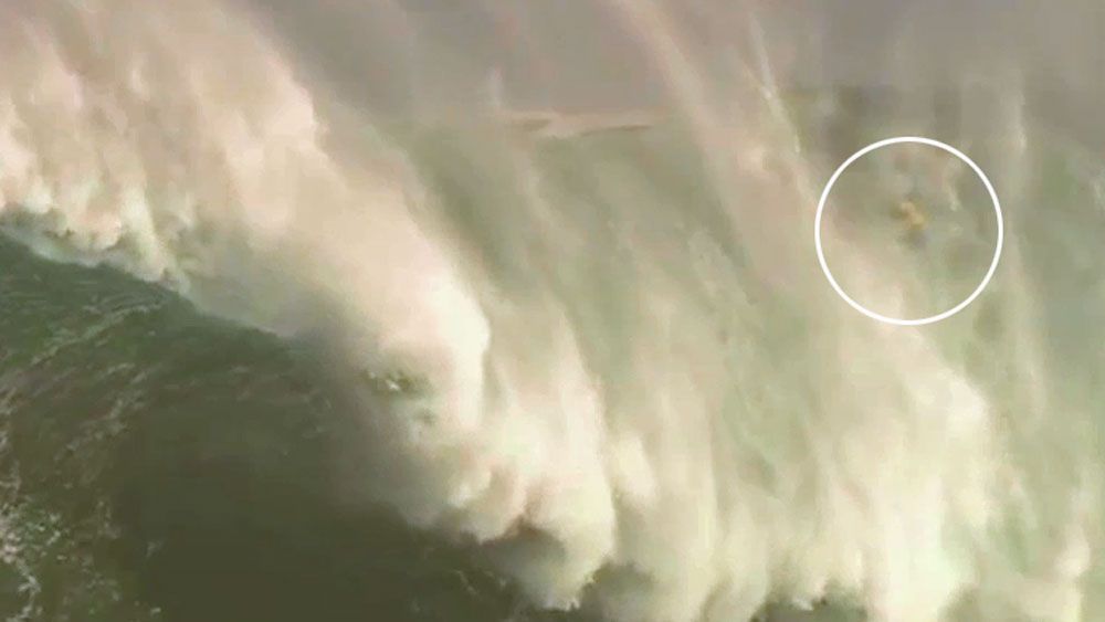 Brazilian surfer survives giant wipeout at 'Jaws'