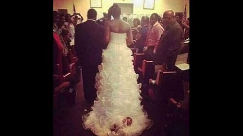 Bride drags daughter down aisle on her train