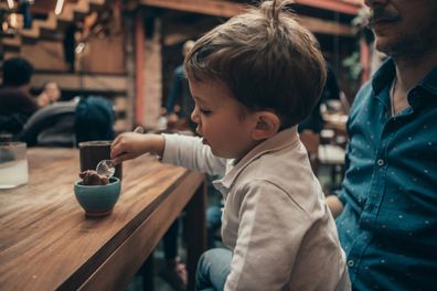 Boy eating at a Mexican Restaurant