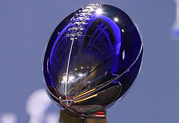 Which football coach is the Super Bowl trophy named after?