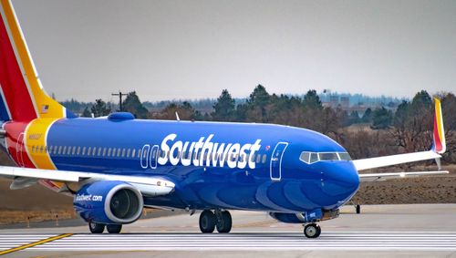A Southwest Airlines Boeing 737-800 turning onto the runway to takeoff.