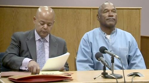 OJ Simpson and his lawyer appear via videolink. (Twitter)