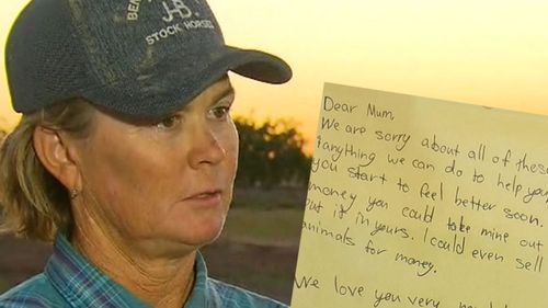 Queensland farmer Jaye Hall and the letter written by her children.