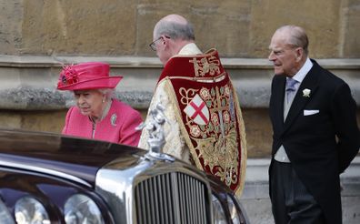 Britain's Queen Elizabeth II, left, and Prince Philip leave the chapel after the wedding of Lady Gabriella Windsor and Thomas Kingston at St George's Chapel, Windsor Castle.