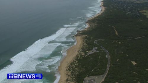 Man dies and dozens more rescued from dangerous surf across Victoria's coastline amid heatwave