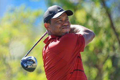 Tiger Woods plays his tee shot on the third hole during the final round of the Hero World Challenge.