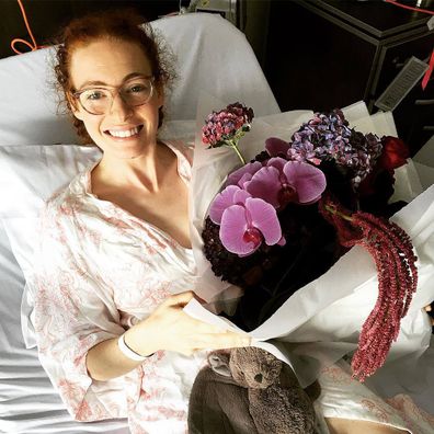 Emma Watkins in hospital after surgery to manage her endometriosis in 2018.