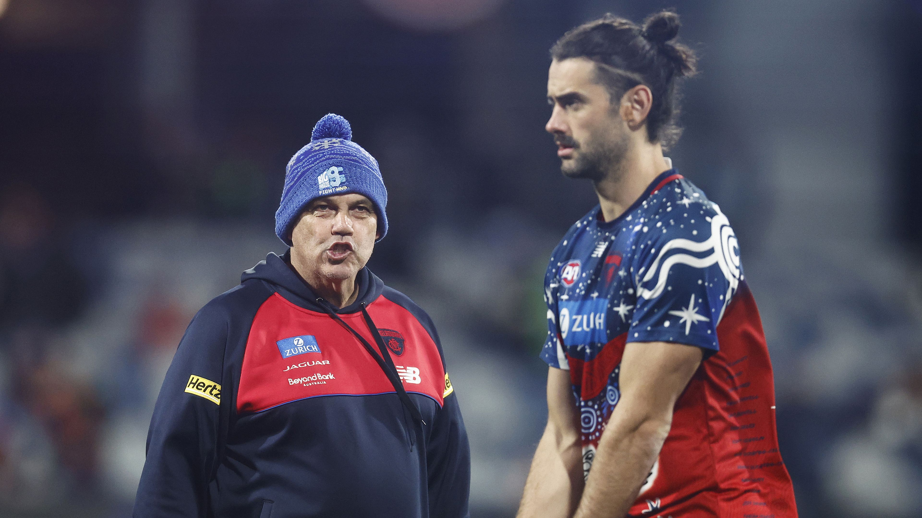 GEELONG, AUSTRALIA - JUNE 22: Demons assistant coach Mark Williams speaks with Brodie Grundy of the Demons before the round 15 AFL match between Geelong Cats and Melbourne Demons at GMHBA Stadium, on June 22, 2023, in Geelong, Australia. (Photo by Daniel Pockett/Getty Images)