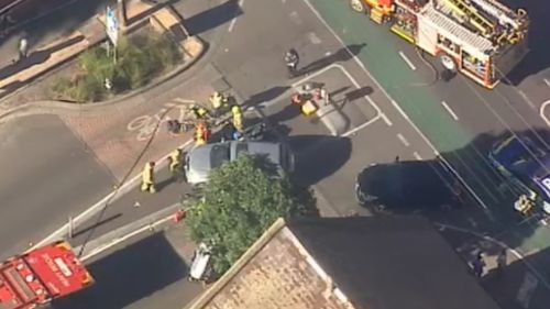 Cyclist freed from underneath car following collision
