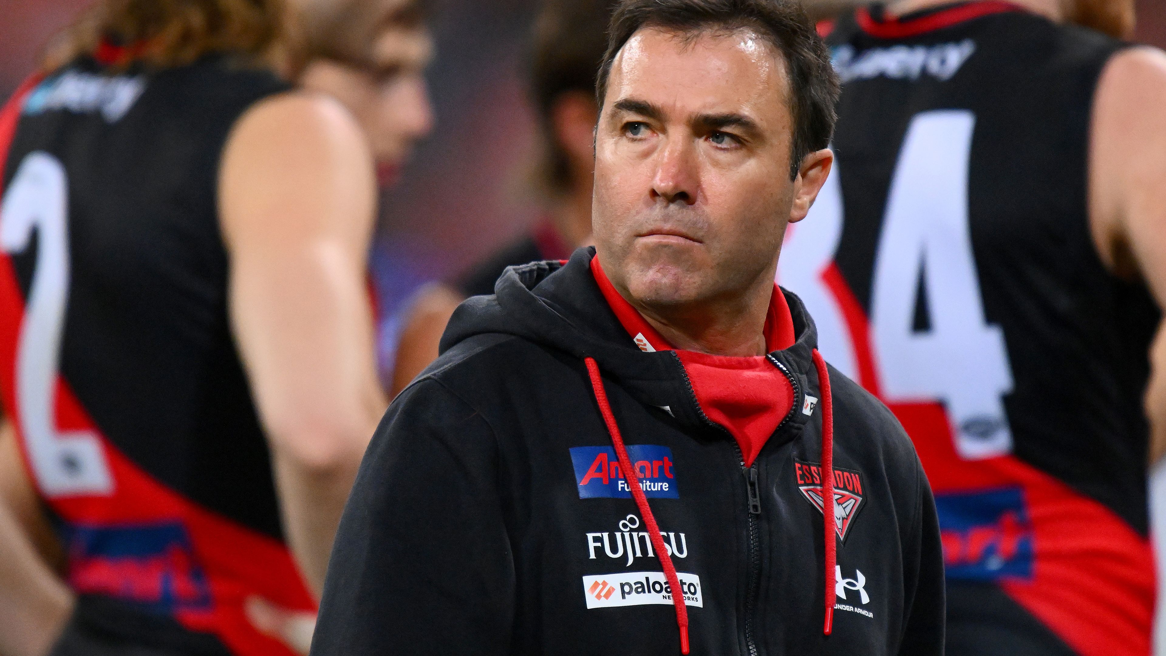 SYDNEY, AUSTRALIA - AUGUST 19: Bombers head coach, Brad Scott reacts during the 2023 AFL Round 23 match between the GWS GIANTS and the Essendon Bombers at GIANTS Stadium on August 19, 2023 in Sydney, Australia. (Photo by Morgan Hancock/AFL Photos via Getty Images)