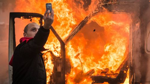 IN PICTURES: Brussels burns as violent clashes ignite in Belgian capital between police and protesters