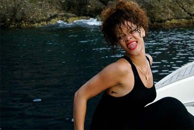 Rihanna shares pics of her vacation sailing around the coast of Italy.
