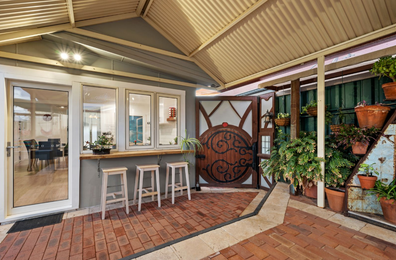 Australia's 'Hobbit door' house finds a buyer.
